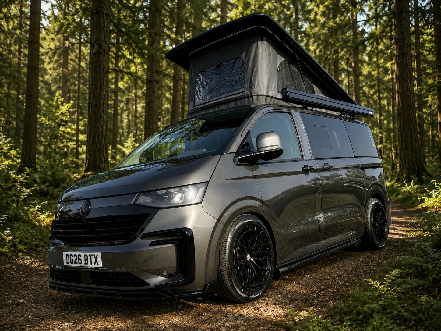 Front view of an Escape Breeze Plus VW T7 4 berth campervan with the pop top roof raised